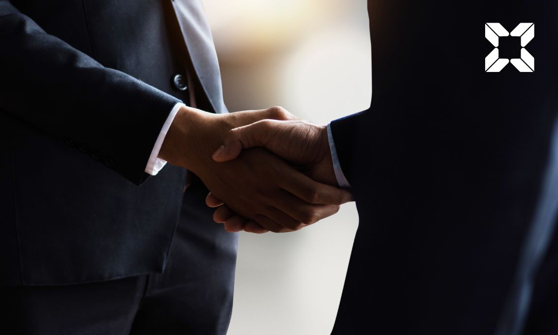 two men shaking hands